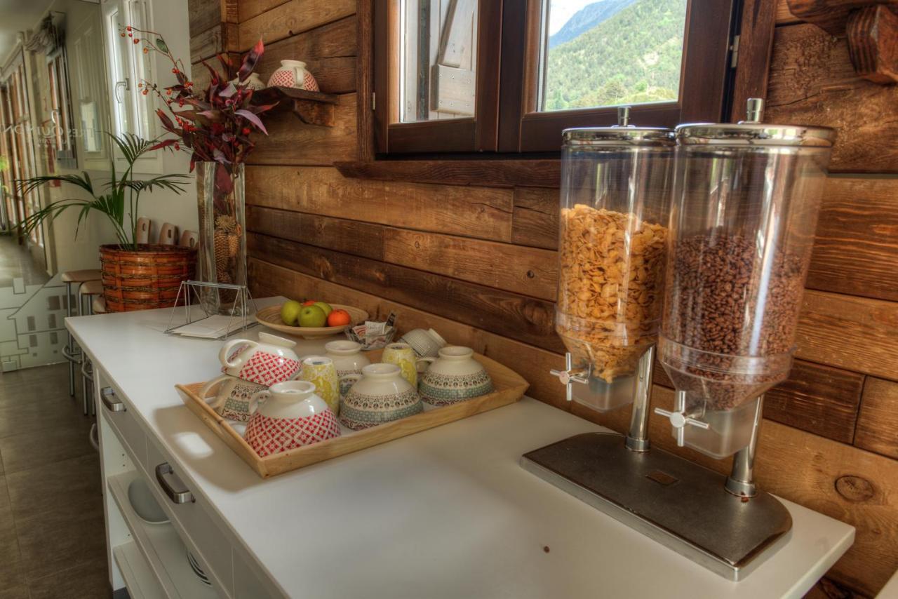 Apartahotel Tres Quinones Sallent De Gallego Bagian luar foto