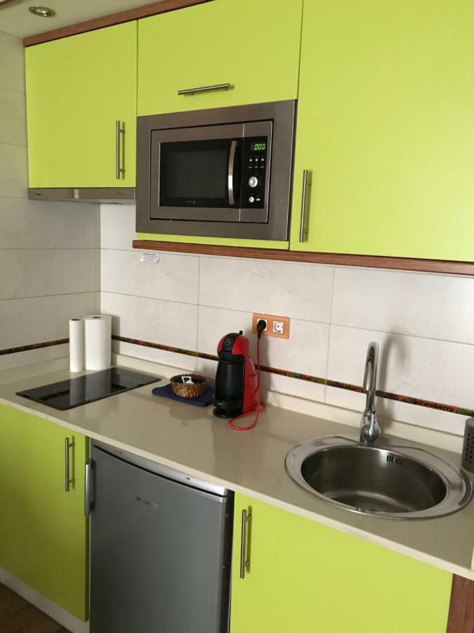 Apartahotel Tres Quinones Sallent De Gallego Bagian luar foto